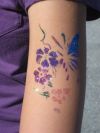 glitter butterfly and flower tattoo